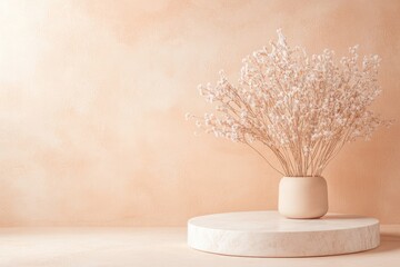 Minimalist Marble Platform Featuring Delicate Flowers in a Soft, Peach-Toned Setting