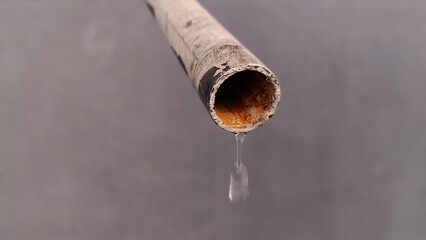 The end of the white pipe that releases water