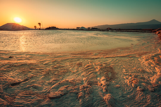 Salt evaporation pond at sunrise near lake Afdera in Afar region, Ethiopia