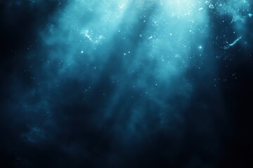 Naklejka premium Underwater low-angle shot of sunlight rays shining through dark ocean; concept, mysterious, deep sea, abstract, nature.