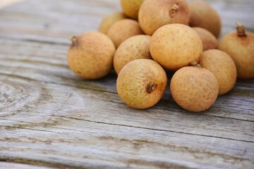 Close-up of fresh lychees on the table.