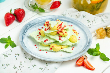 Sweet meringue dessert in a plate, restaurant. Horizontal frame.