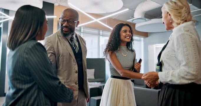 Handshake, meeting and smile with business people in lobby of office together for agreement or welcome. B2B, deal and partnership with happy employee group shaking hands in convention center