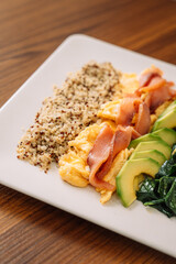 Hearty breakfast with Salmon, Quinoa, Avocado Scrambled Eggs