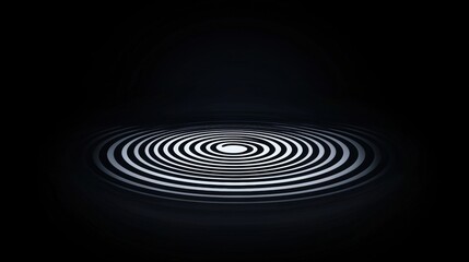 A black and white spiral pattern on a white background.