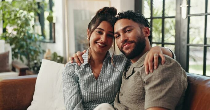 Home, sofa and face of couple for hug, bonding together and healthy marriage with love in lounge. House, man and happy woman in portrait for relax, commitment and affection in relationship on couch