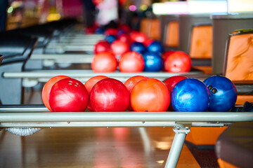 Bowling balls in a bowling club. Horizontal photo with shallow depth of field