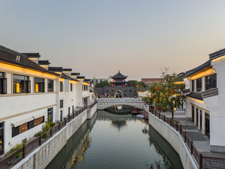 Tranquil Waterfront Scene Showcasing Traditional Architecture and Scenic Beauty