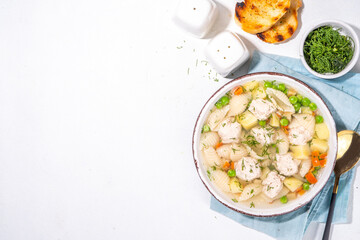 Homemade soup with meatballs