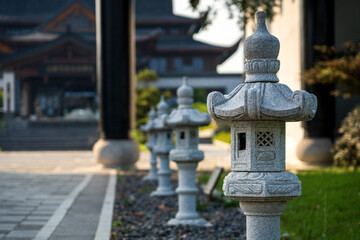 Obraz premium Traditional Stone Lanterns in Tranquil Zen Garden