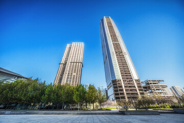 Soaring Towers Against Blue Sky in City Center