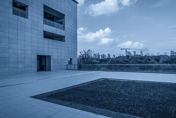 Modern Architectural Landscape with Urban Skyline in Blue Tones