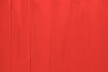 Texture of red wooden surface as background, closeup