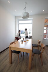 Mother and a boy spending time together playing indoors