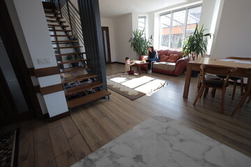 Mother and a boy child play together indoors