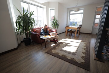 Mother and a boy child play together indoors