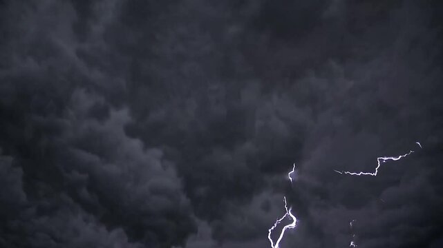 Lightning Striking Dark Storm Clouds, Electric Flash in Dramatic Sky with Intense Weather Conditions Stock Video 4K Ultra HD MP4 Time Lapse Weather Video Footage Download