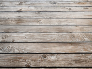 Fototapeta premium Teak deck weathered to a silver patina with raised grain showcasing its nautical character