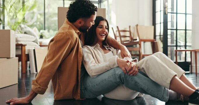 Couple, relocation and moving boxes in home, hug and property investment or real estate mortgage. People embrace, cardboard package and owners of new house, conversation and residential achievement
