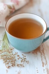 Relaxing Herbal Tea in Teal Cup on Rustic Wooden Table