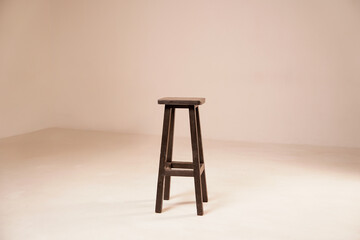 wooden chair on beige background