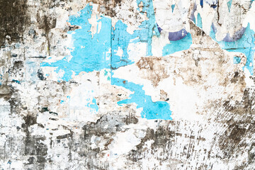 Glued torn paper on the wall