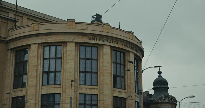 Komensk&yacute; University historic facade with large windows in Bratislava