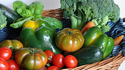 Fresh vegetables in wicker basket.