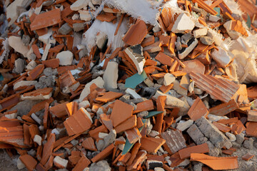 construction waste. A pile of red bricks.