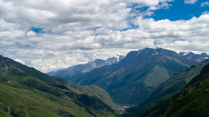 rocky mountain peaks in the clouds. cloud cover in the mountains