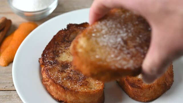 Traditional Spanish torrijas for Holy Week on wooden table. French Toast.