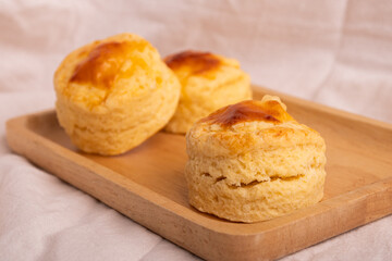 Homemade Cheese Scone on wooden plate