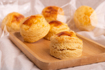 Homemade Cheese Scone on wooden plate