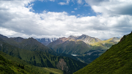 rocky mountain peaks in the clouds. cloud cover in the mountains