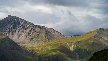 rocky mountain peaks in the clouds. cloud cover in the mountains