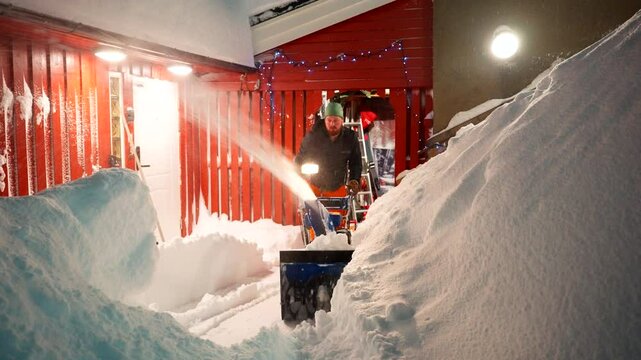 Winter weather clearing tasks, young man, snow plough machinery control