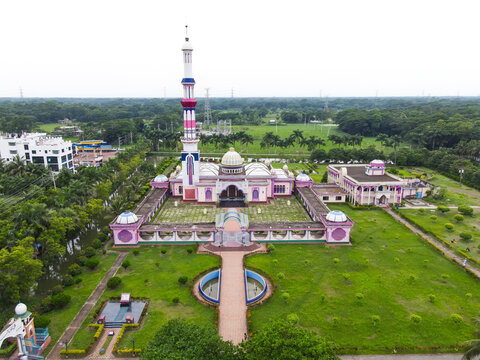 Aerial view of baitul aman jame mosque surrounded by lush greenery and gardens, Barishal, Barishal, Bangladesh.