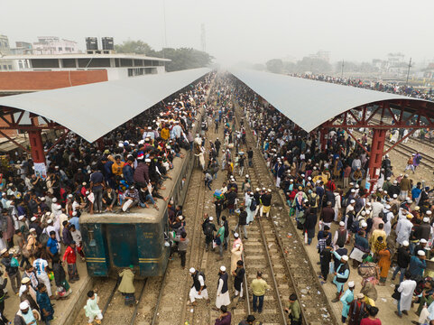 Gazipur, Bangladesh - 02 February 2025: Aerial view of a bustling train station with a vibrant crowd and dynamic activity, Tongi, Gazipur, Dhaka, Bangladesh.