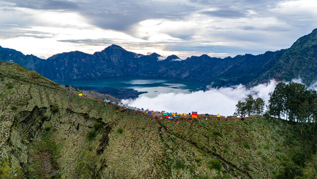 Aerial drone view of basecamp on active Rinjani volcano on the island of Lombok, Indonesia