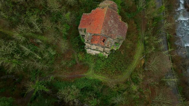 Aerial View Of The Abandoned Chiesa della Madonna Assunta (Santa Maria di Lago Pigo), Castel Vittorio, Imperia, Italy.