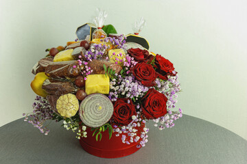 Festive greeting food bouquet on the tablecloth