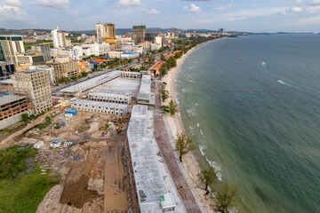 Aerial view of modern coastal cityscape with beach and ocean, Sangkat Buon, Preah Sihanouk Municipality, Sihanoukville, Cambodia.