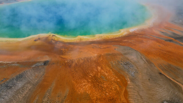 Aerial view of grand prismatic spring with mist in geothermal area, Yellowstone National Park, Wyoming, United States.