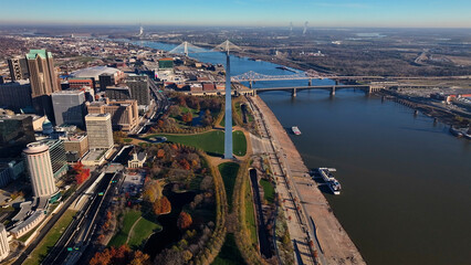 Aerial view of the iconic Gateway Arch and Mississippi River with urban skyline and bridges, Downtown St. Louis, Missouri, United States.