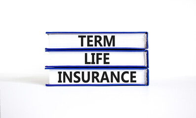 Term life insurance symbol. Concept words Term life insurance on beautiful blue white books....