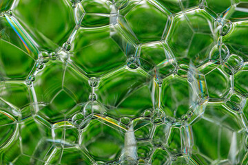 Abstract green background with a pattern resembling soap foam 