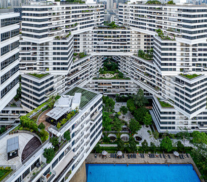 Aerial view of interlace condominium surrounded by lush greenery and featuring rooftop gardens, Bukit Merah, South West Community Development Council, Singapore.