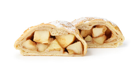 Pieces of tasty apple strudel with powdered sugar isolated on white