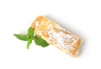 Piece of tasty apple strudel with powdered sugar and mint isolated on white, top view