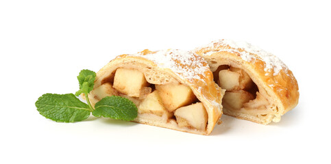Pieces of tasty apple strudel with powdered sugar and mint isolated on white